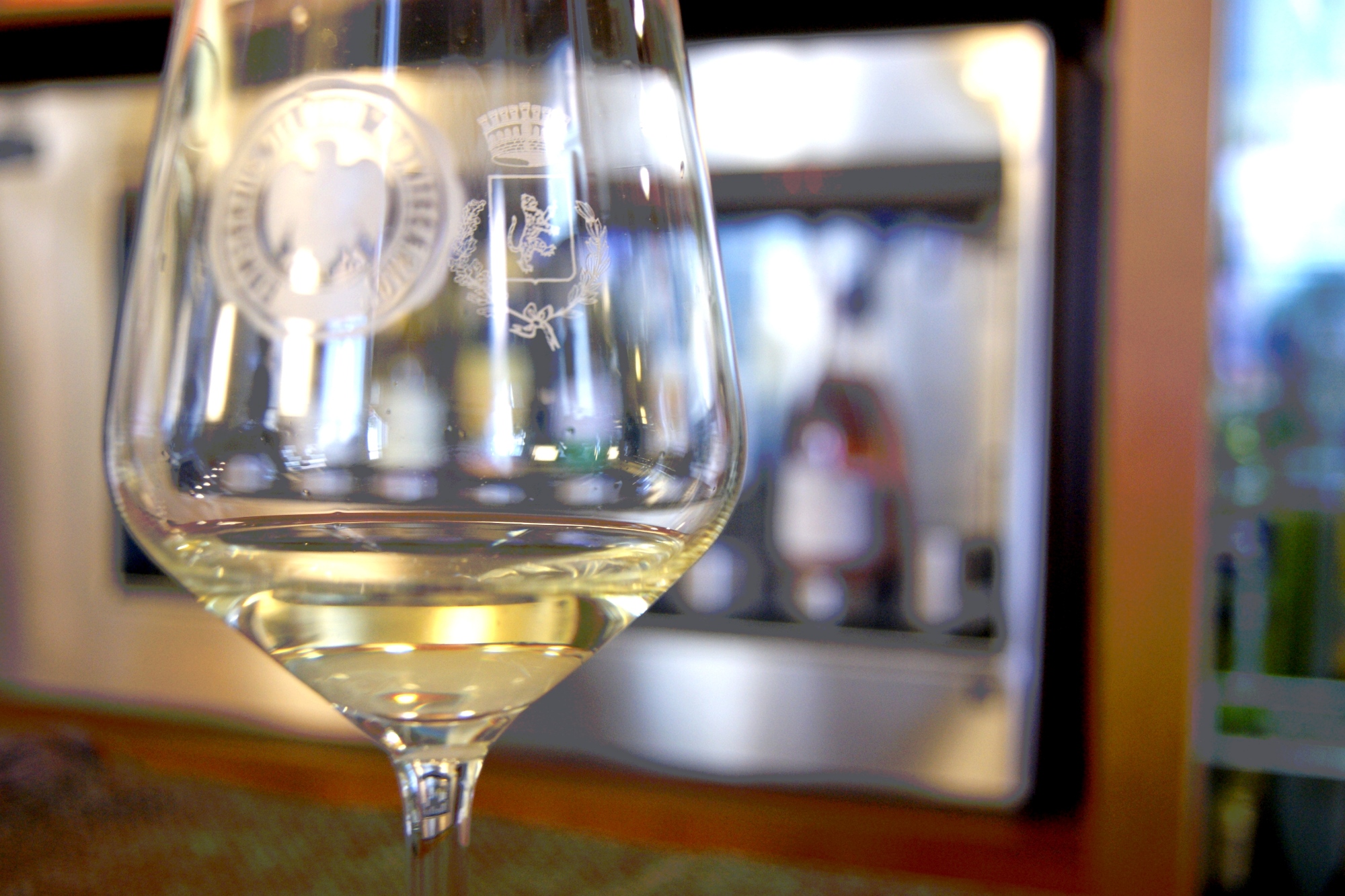 A glass of white Montecarlo DOC