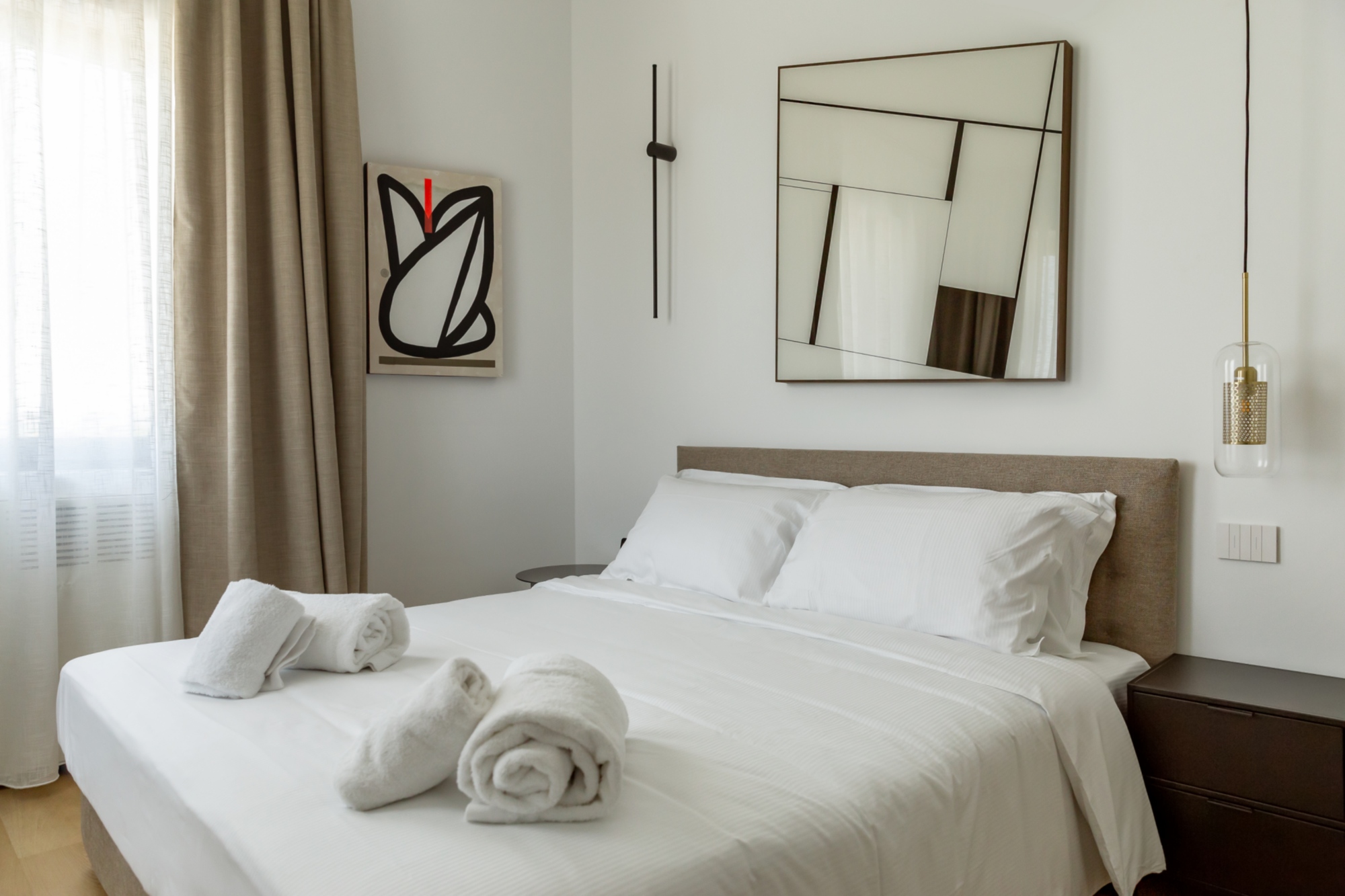 A double bedroom of Tenuta Asmara with white sheets