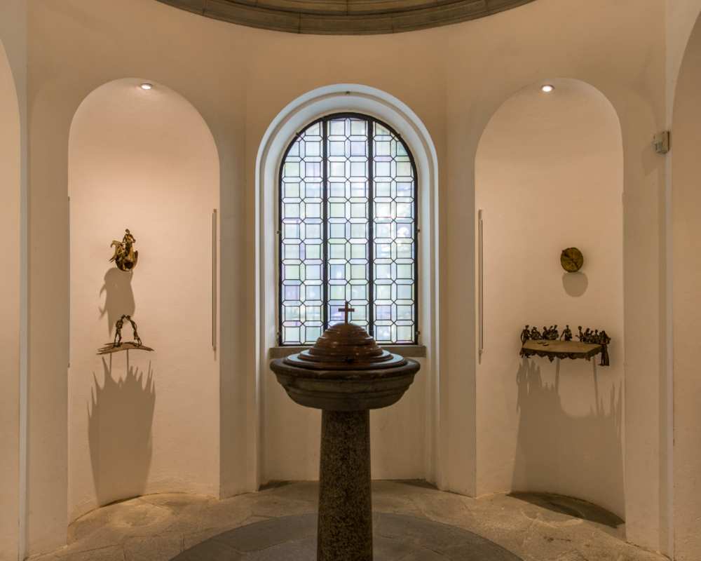 Cecco Bonanotte's baptismal font and sculpture cycle