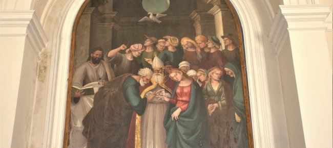 The Marriage of the Virgin which derives from the workshop of Luca Signorelli of 1465
