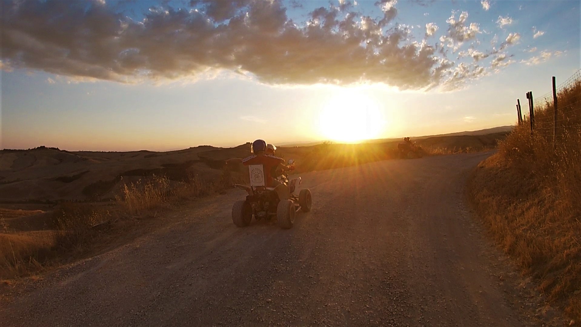 A quad tour at sunset on the hills of Asciano