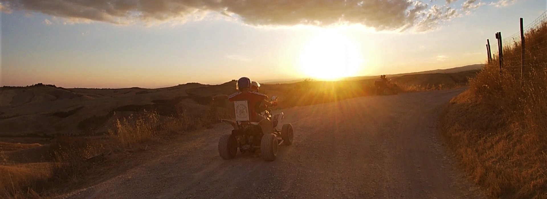 A quad tour at sunset on the hills of Asciano