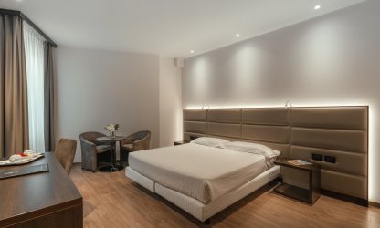 Bedroom at Hotel Minerva in Arezzo