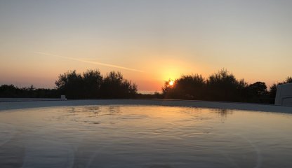 piscina al tramonto San Vincenzo Livorno