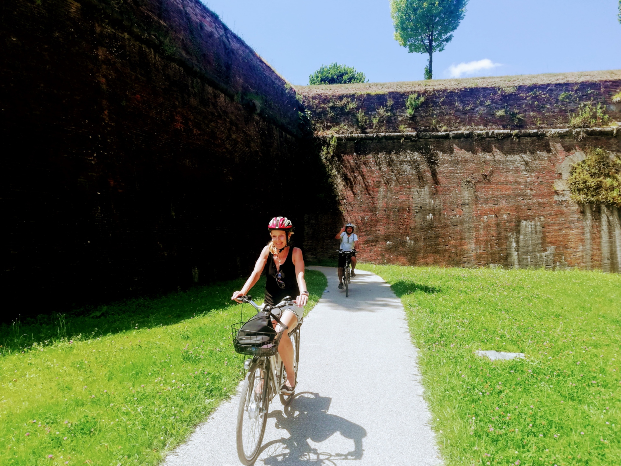 Visit Lucca by bike and taste the typical products