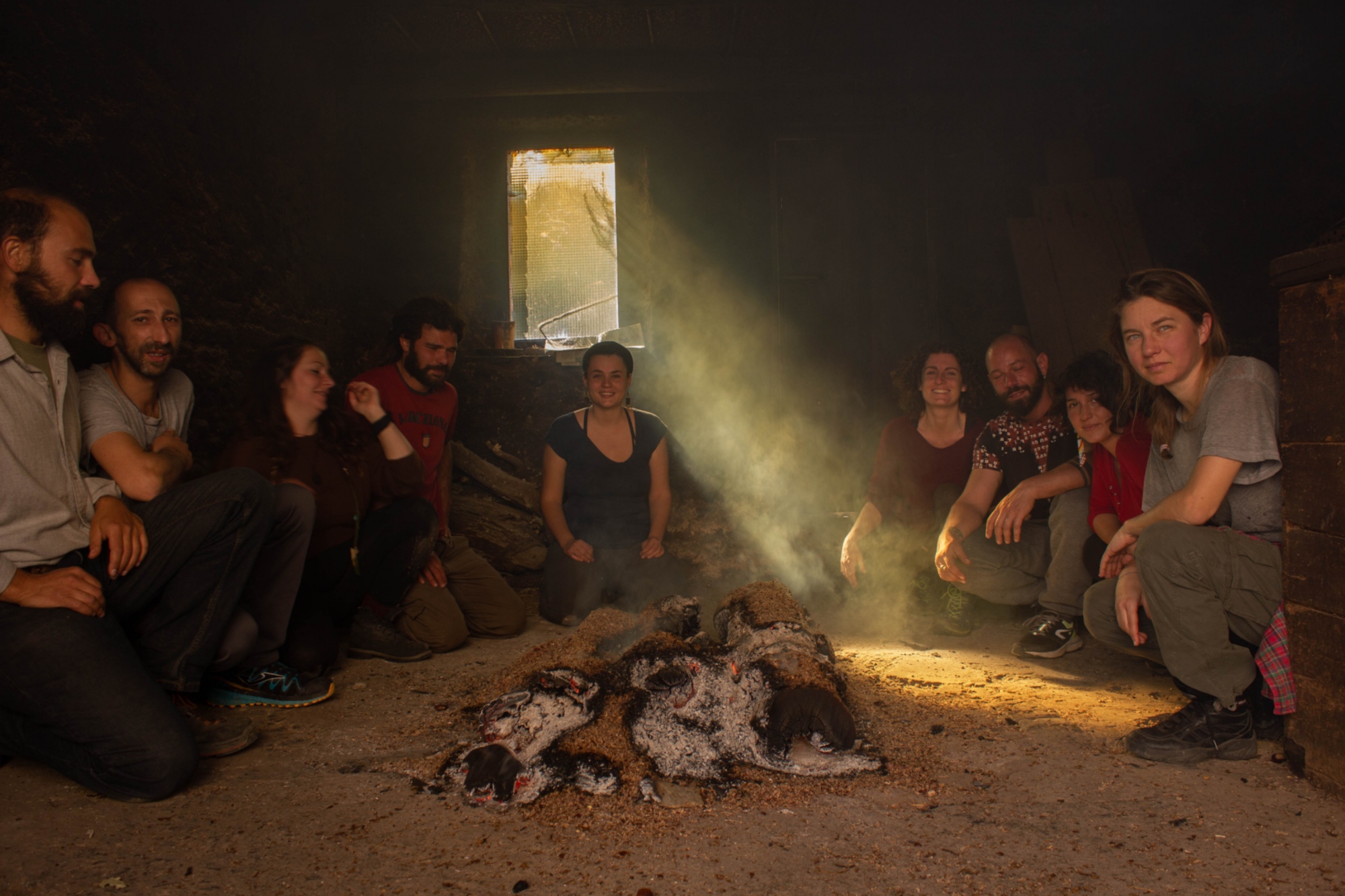 Young people around the chestnut drying kiln (gradile)