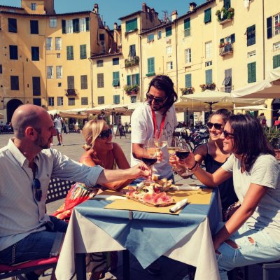 Visit Lucca by bike and taste the typical products
