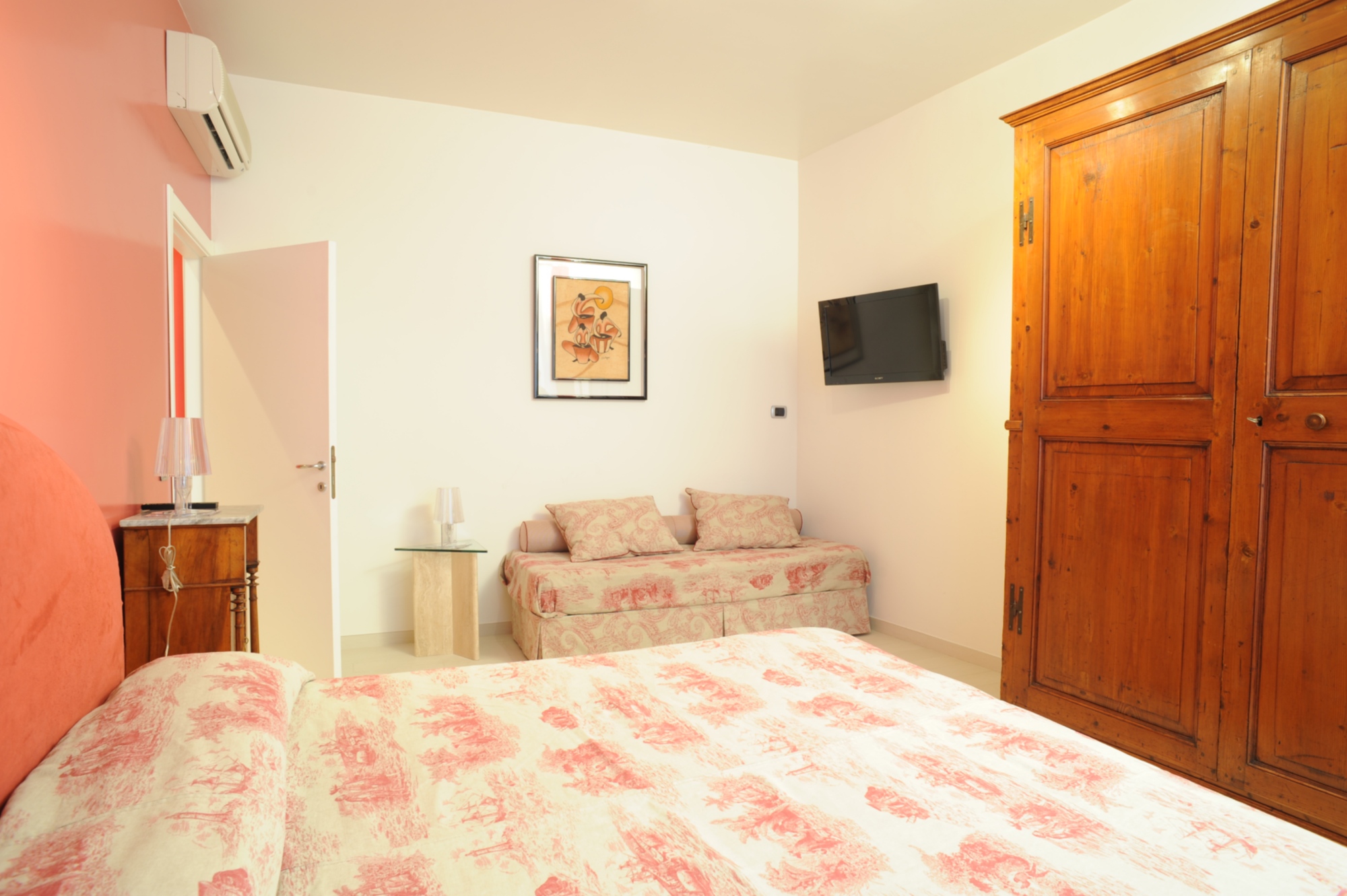 Red and green Siena camera tripla (letto matrimoniale+letto singolo)