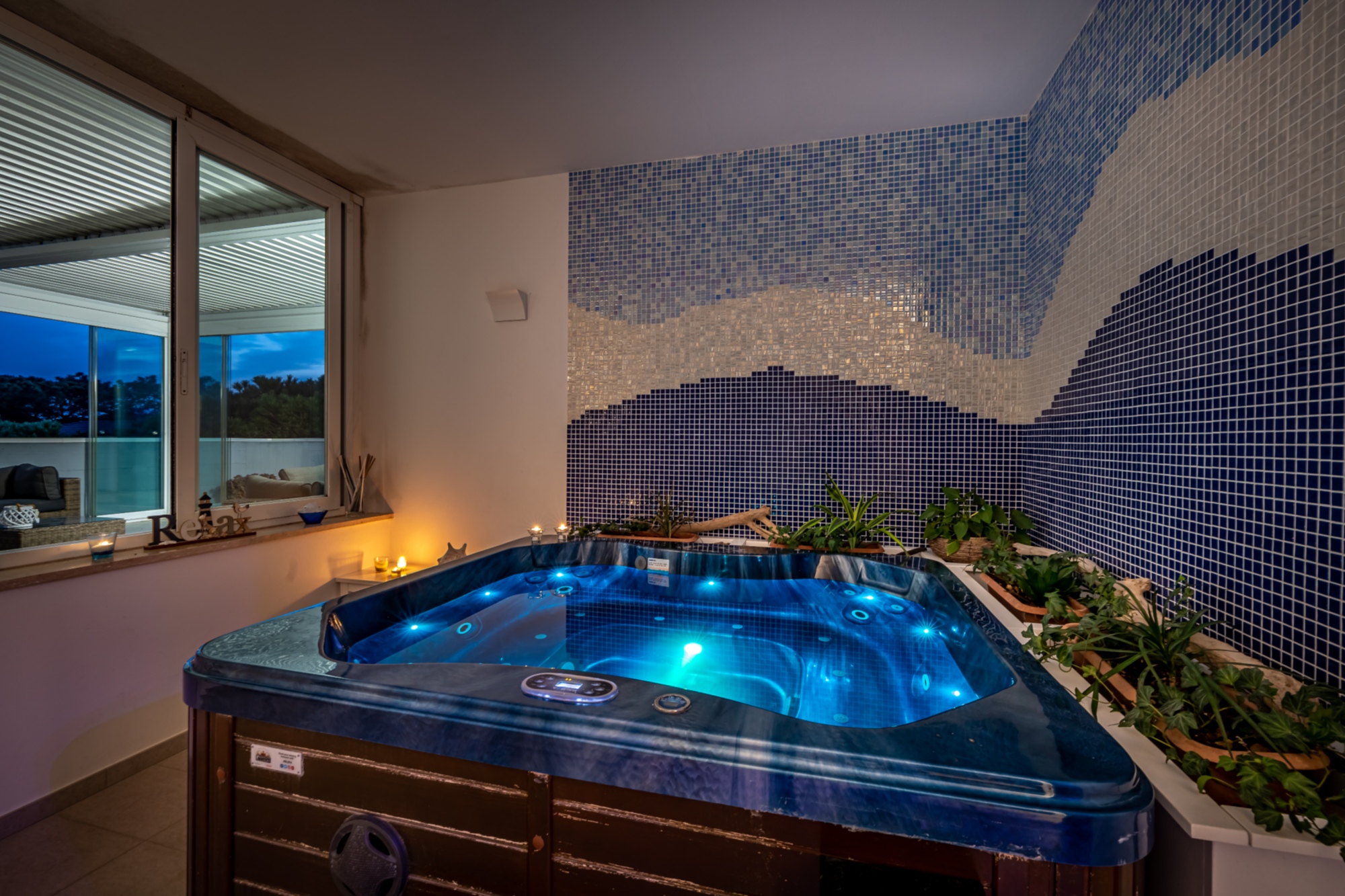 A little spa room with blue electric lights