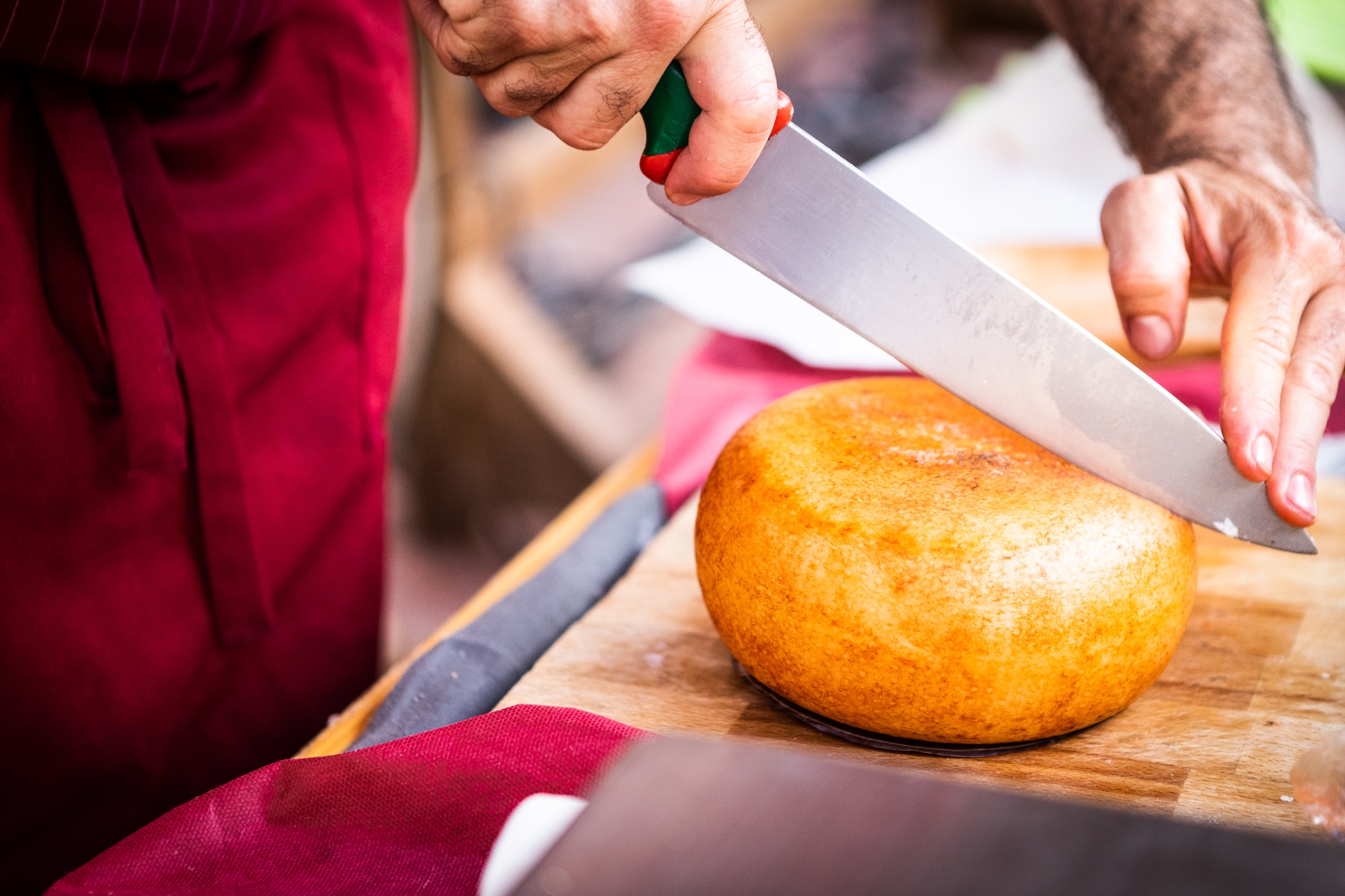 Cutting Pecorino cheese