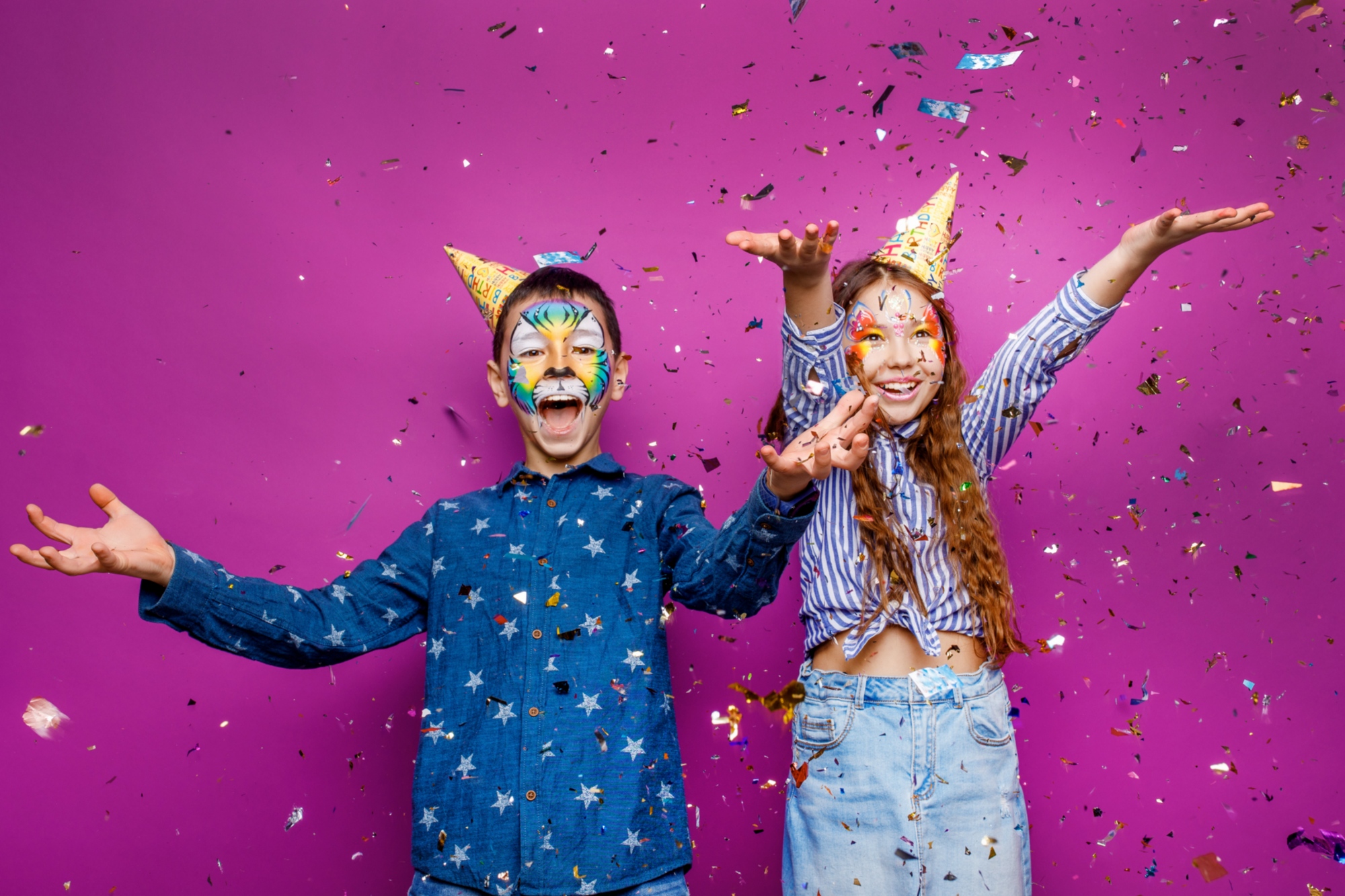 portrait-of-positive-cheerful-little-girl-and-boy-have-fun-isolated-over-violet-color-wall-serpentine-flying.jpg