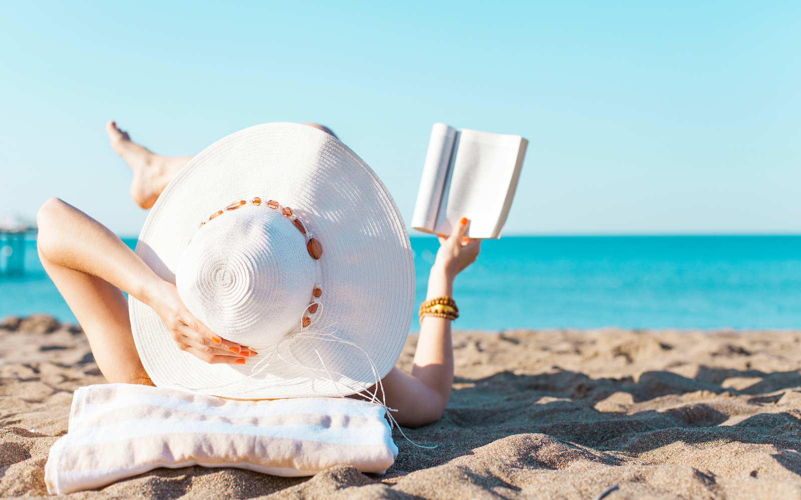 A girl relaxes by the sea