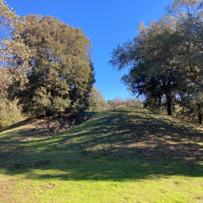 Trekking in Maremma. A tomb of the Etruscan necropolis in Poggio Tondo, between Castiglione della Pescaia and Follonica.