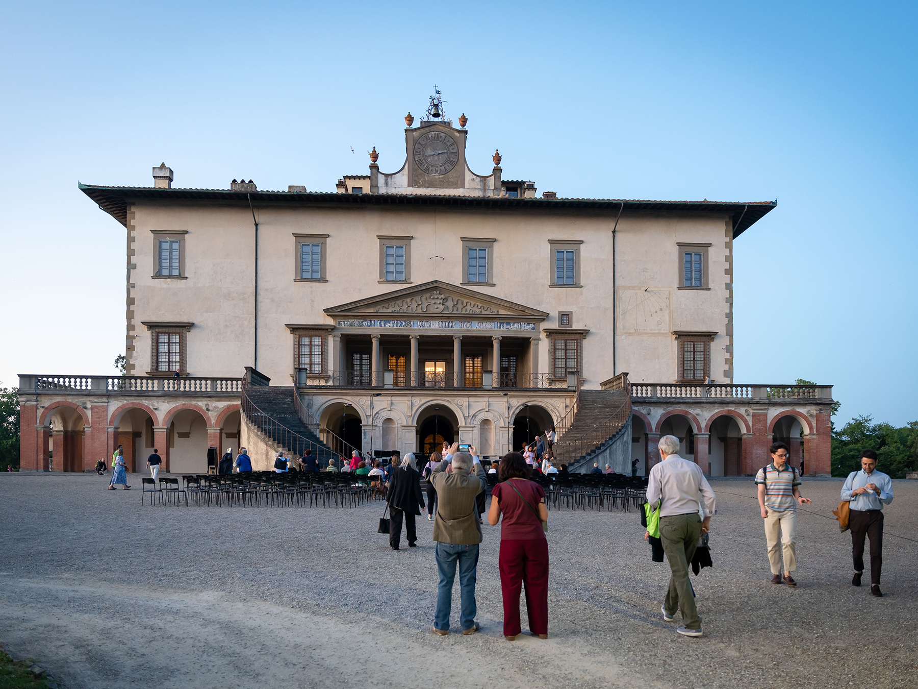 People heading to a sunset concert at the Medici Villa in Poggio a Caiano