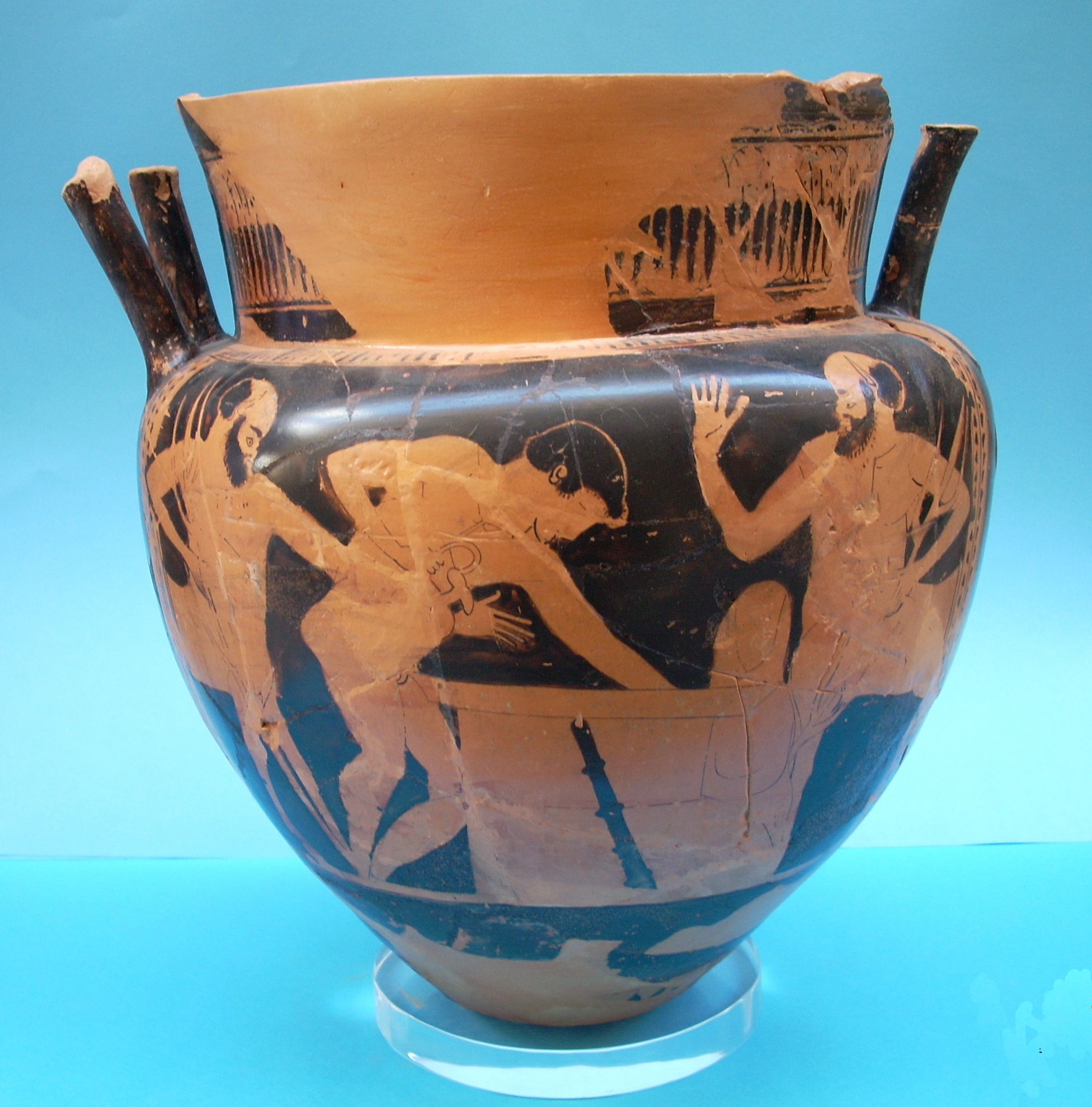 Un vaso etrusco che rappresenta le fasi preparatorie del vino in Etruria