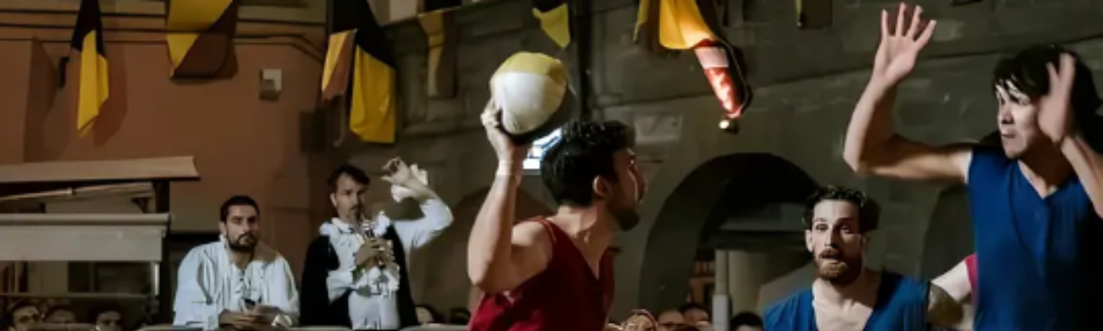 Immagine del Giovo del pozzo con i giocatori che si contendono la vittoria