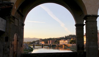 View of Arno river from the Old Bridge in Florence