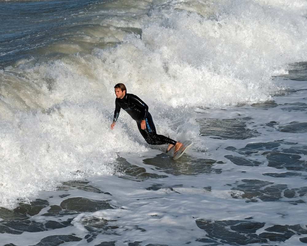 A surfer in Lido di Camaiore