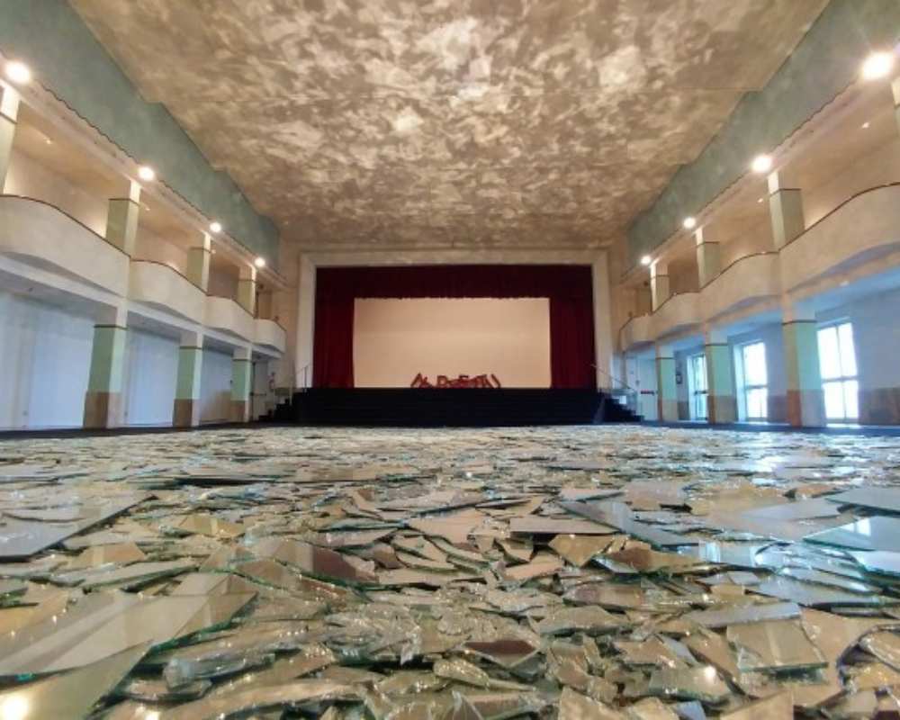 “Le grand miroir du monde” by Kader Attia in the auditorium hall of the Galleria Continua, in San Gimignano
